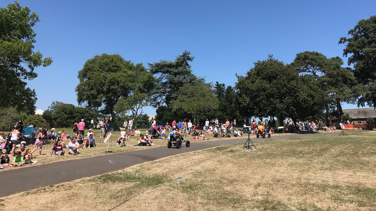 Pedal car race track with spectators