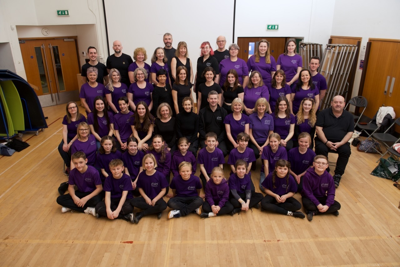 Group theatre company photo as shot in a school